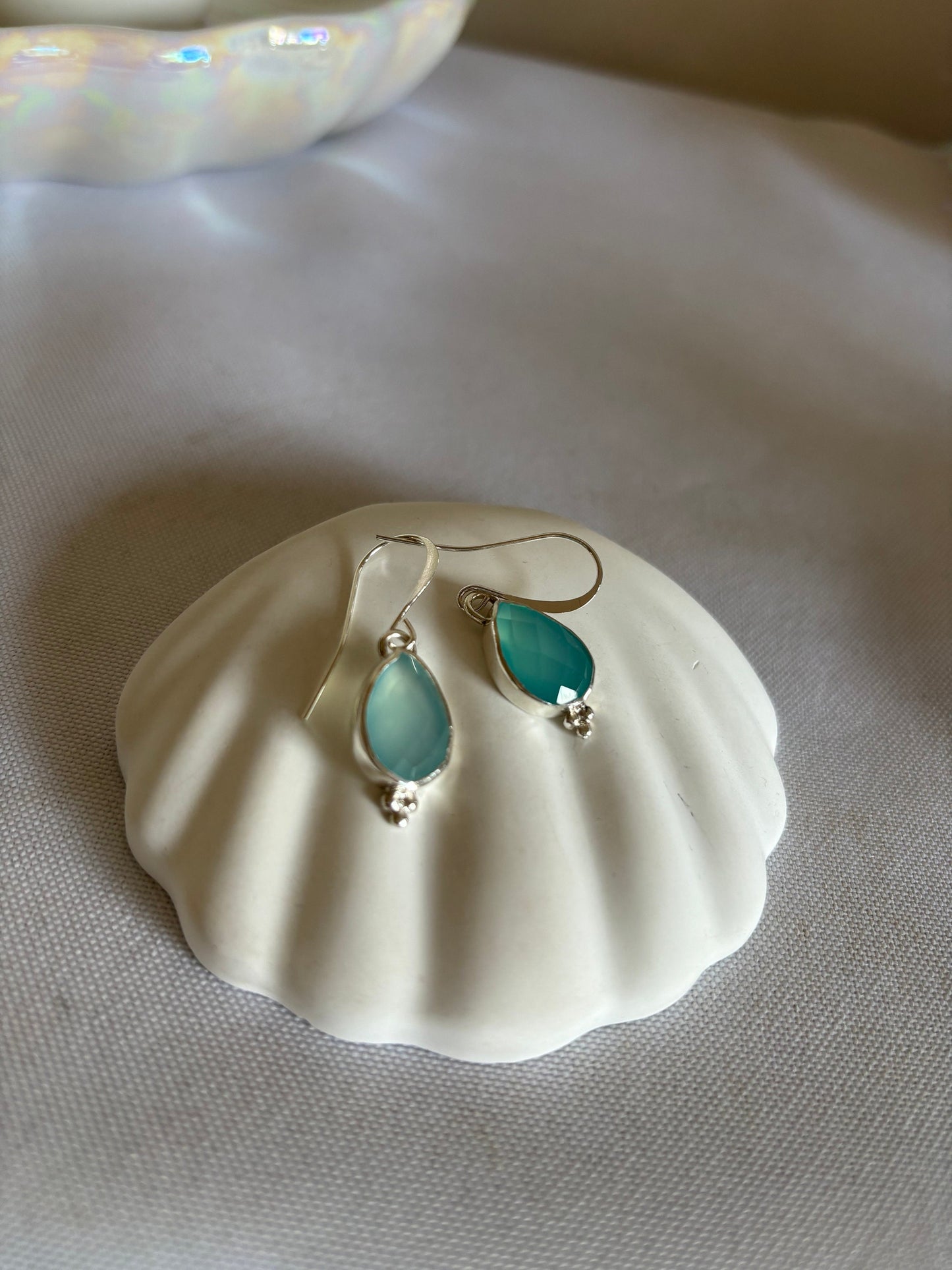 Blue chalcedony unsymmetrical pear shape 925 sterling silver earrings