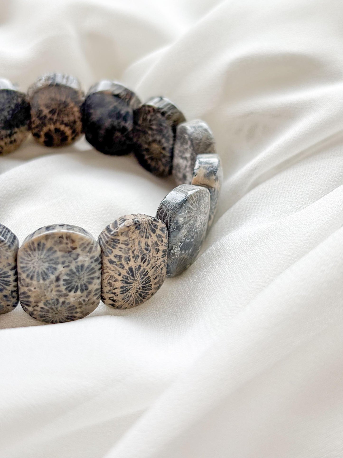 Earth’s Timeless Bloom – Charcoal Fossil Coral Daisy Bracelet