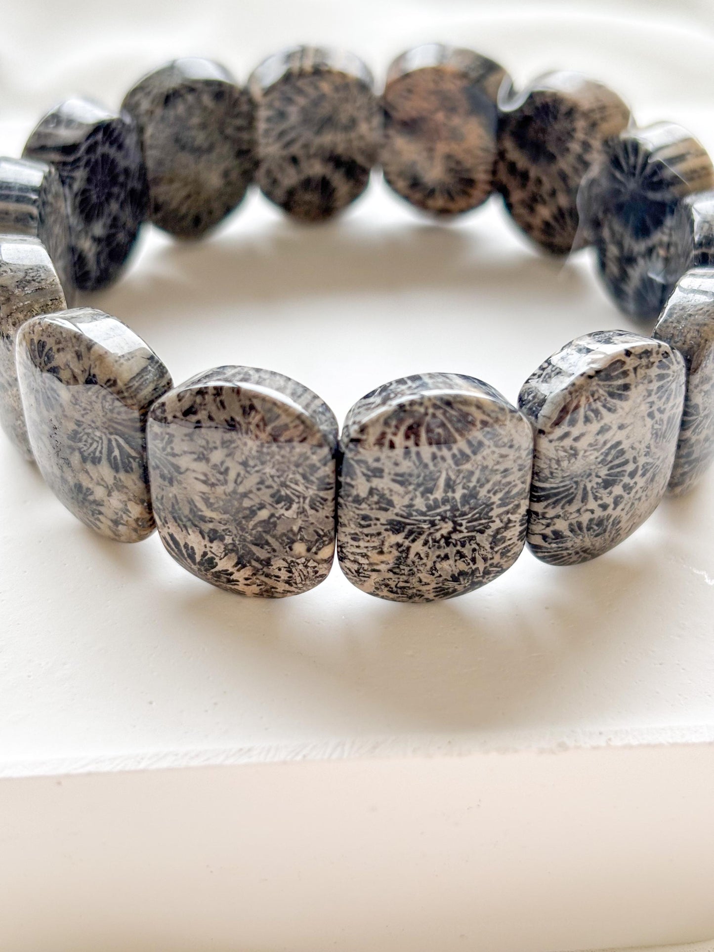Earth’s Timeless Bloom – Charcoal Fossil Coral Daisy Bracelet