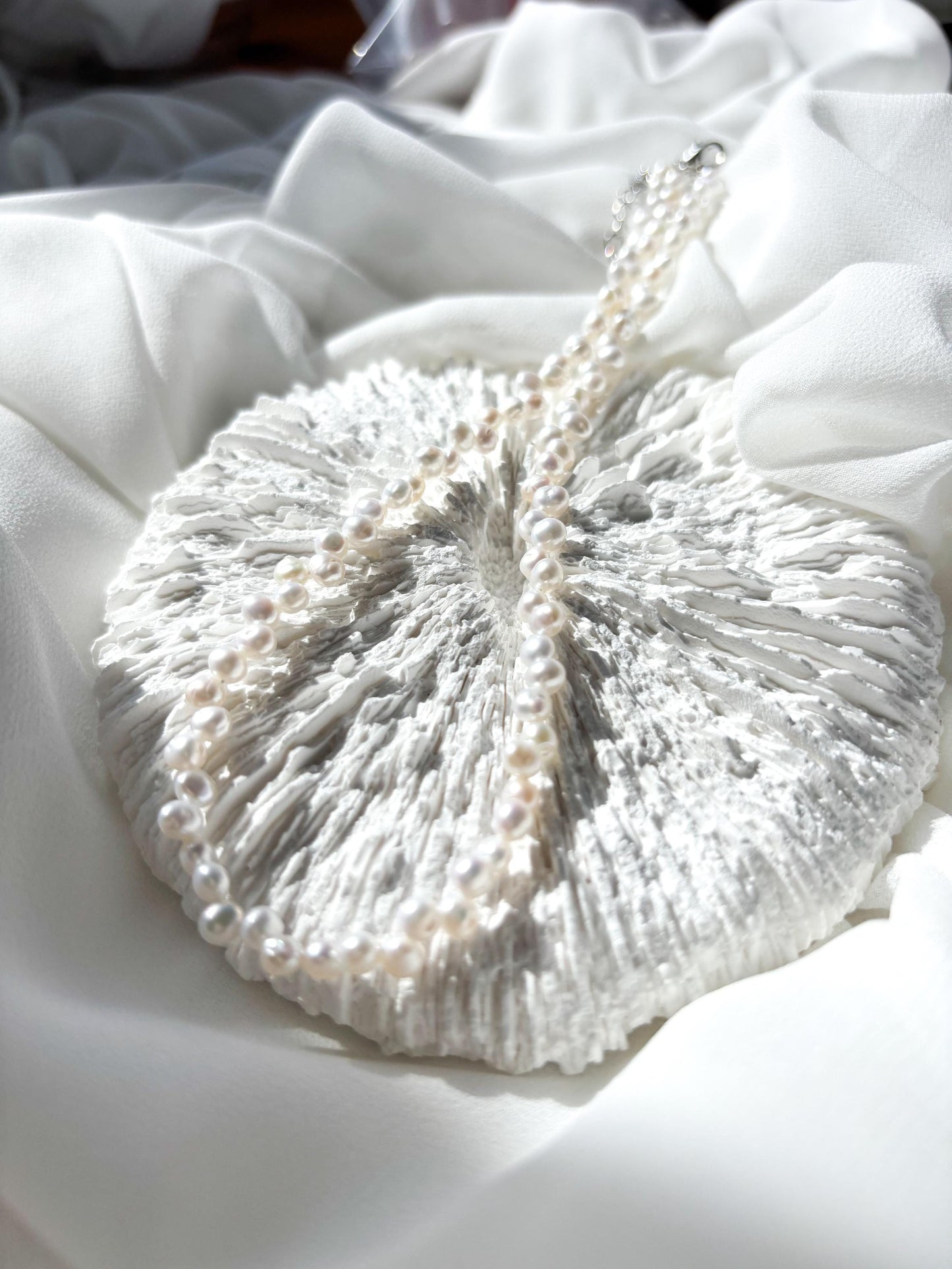 Snow Petal – Staggered White Freshwater Pearl Necklace