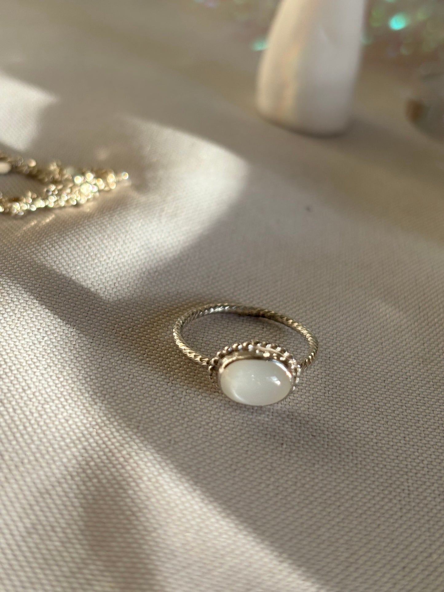 White elephant oval moonstone ring, 925 sterling silver
