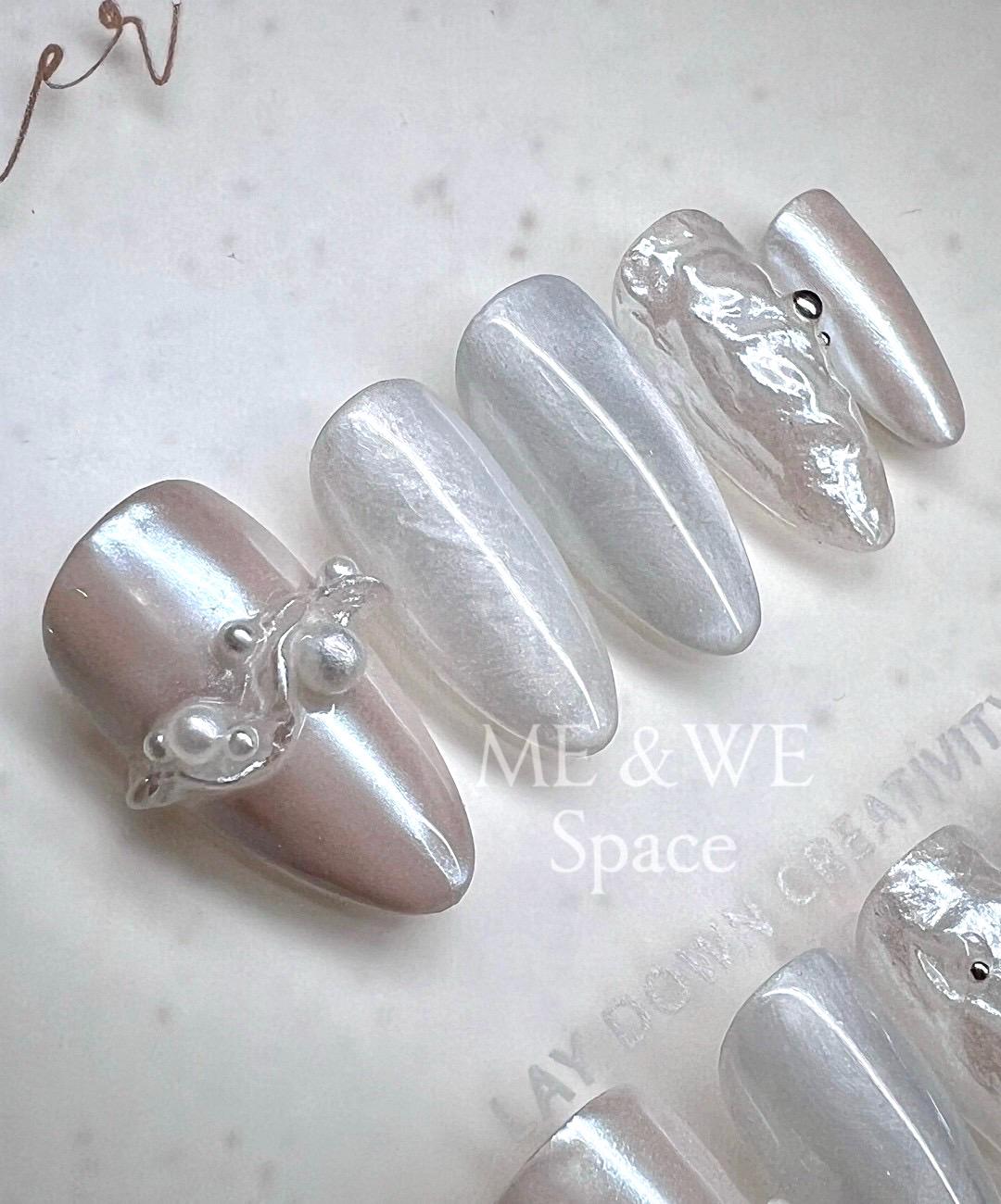 Pearls in splashing water press-on nail (Middle Almond)  Only XS available
