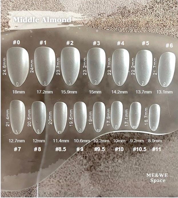 Pearls in splashing water press-on nail (Middle Almond)  Only XS available