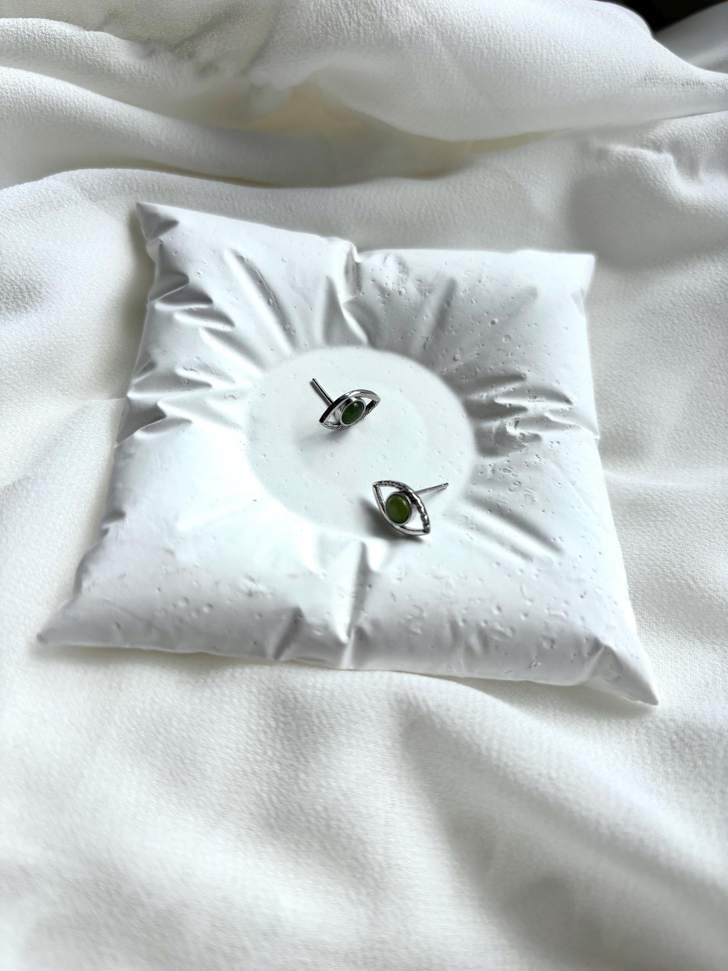 Serpent’s Gaze: Serpentine Eye Stud Earrings