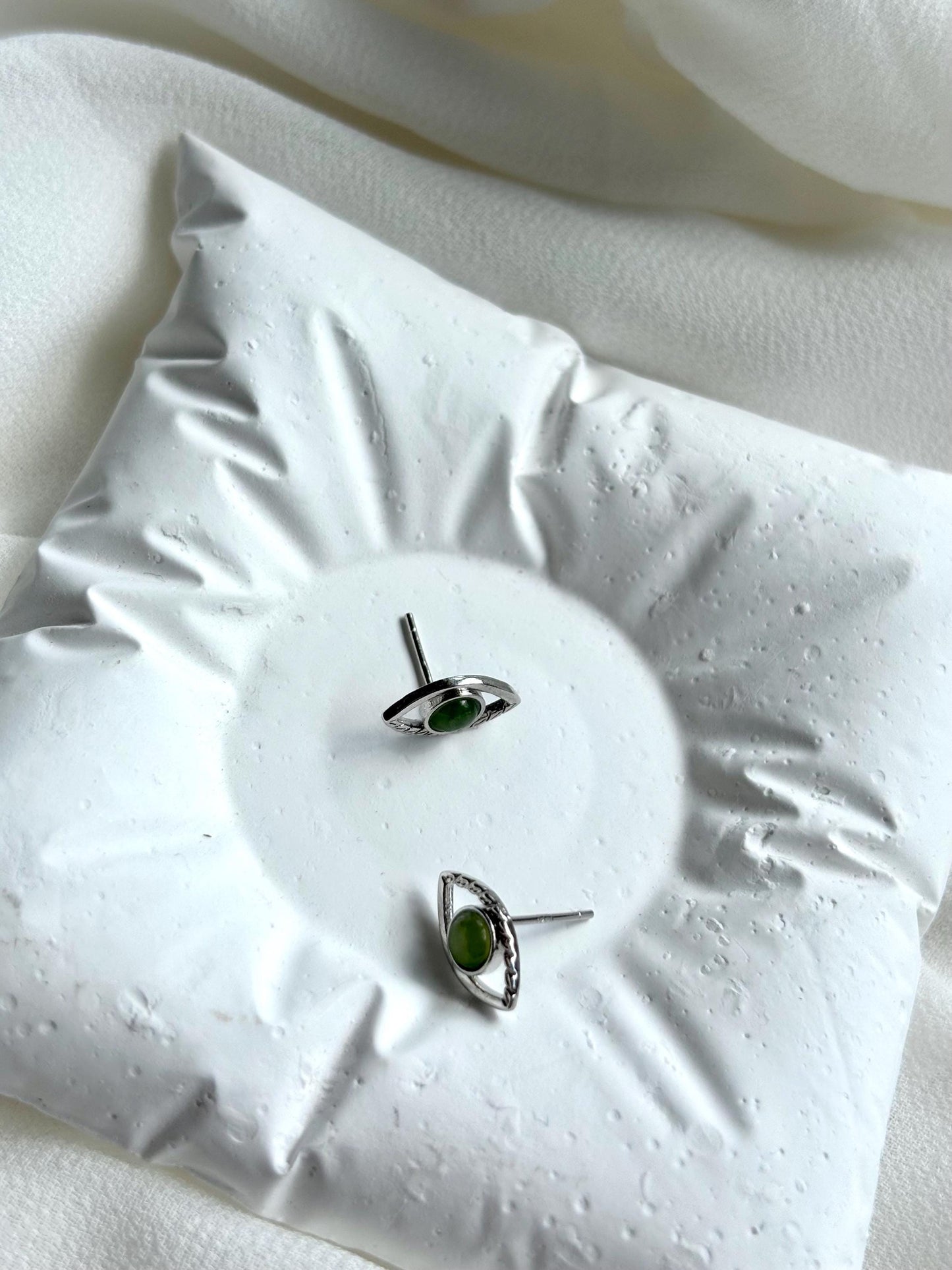 Serpent’s Gaze: Serpentine Eye Stud Earrings