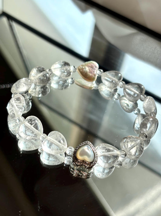 Icy Heart Clear Quartz Bracelet with Heart-Shaped Beads, Pearl, and Mother of Pearl Accents.