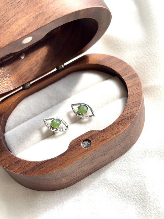 Serpent’s Gaze: Serpentine Eye Stud Earrings