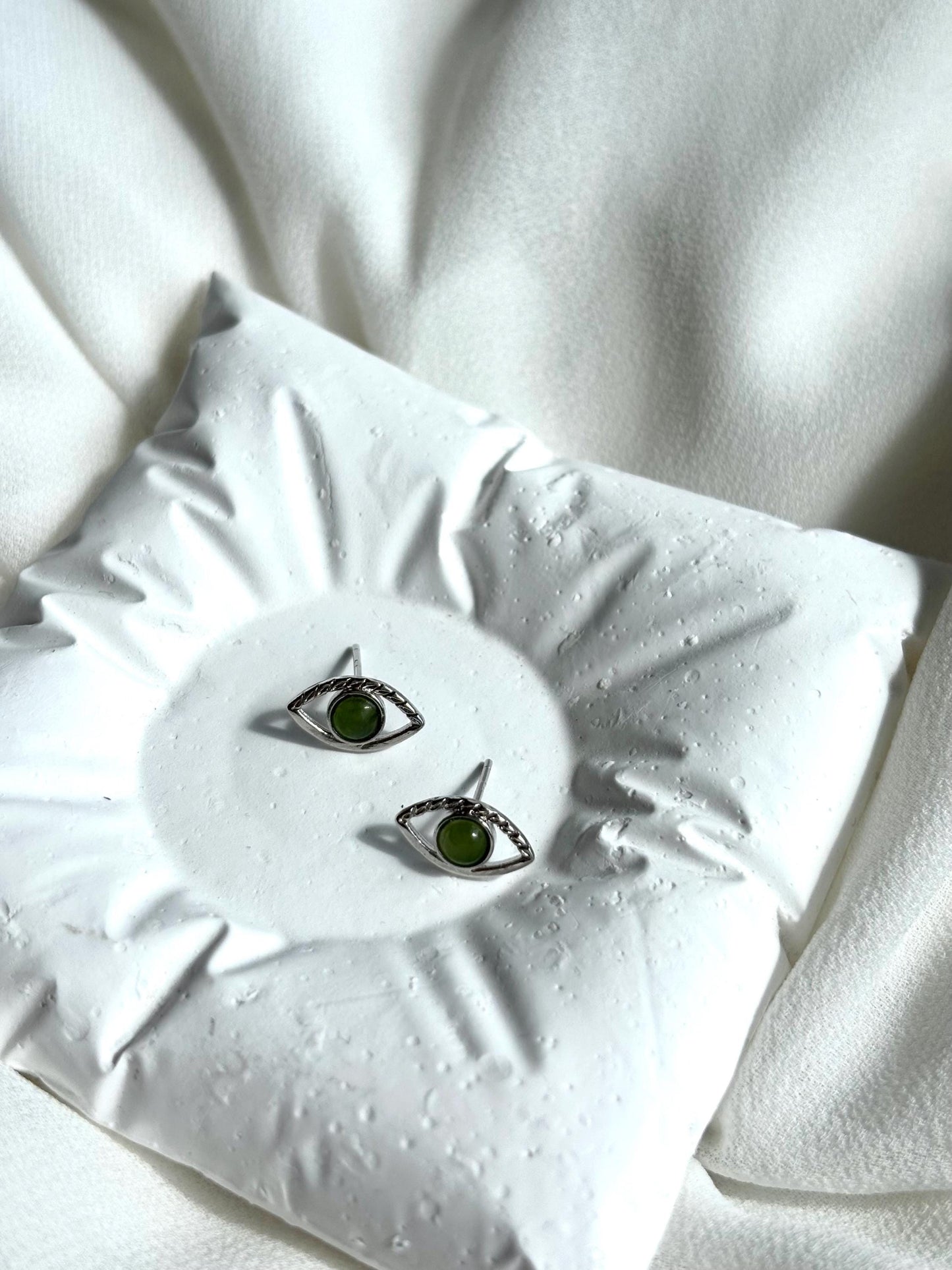 Serpent’s Gaze: Serpentine Eye Stud Earrings