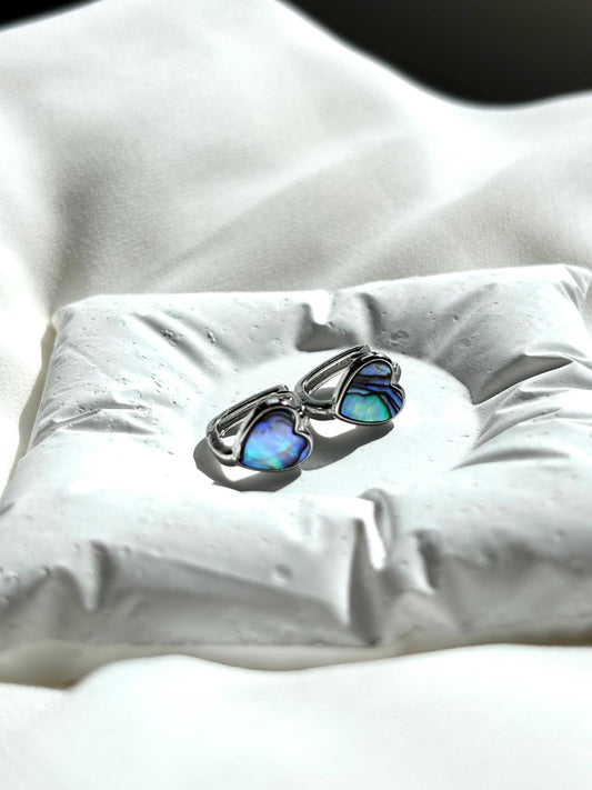 Heart-Shaped Mother of Pearl Huggie Earrings with Black and Blue Hues – Sterling Silver Wire