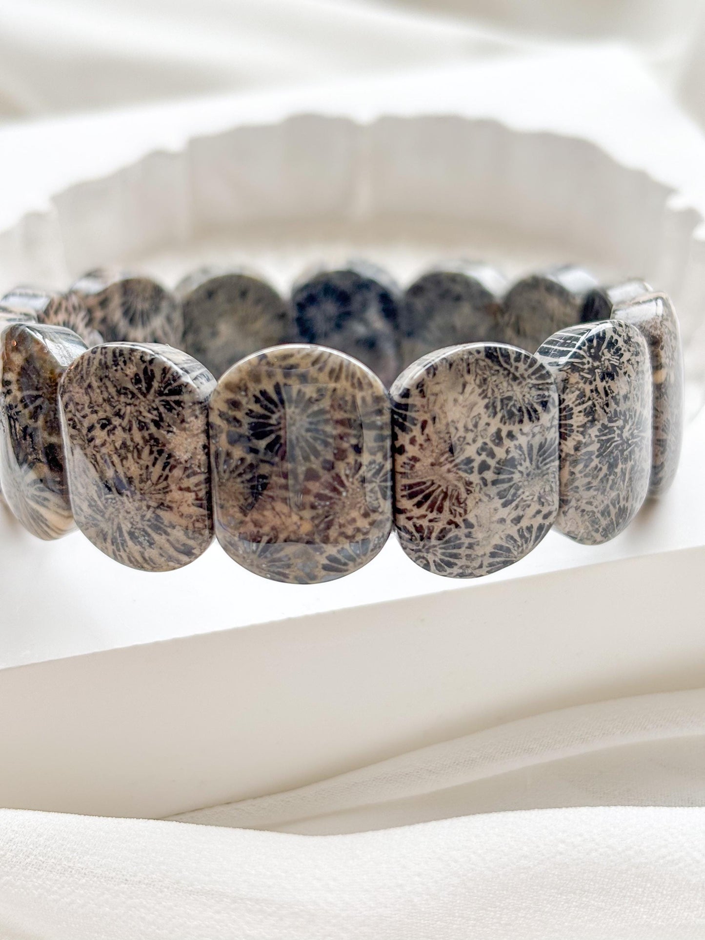 Earth’s Timeless Bloom – Charcoal Fossil Coral Daisy Bracelet