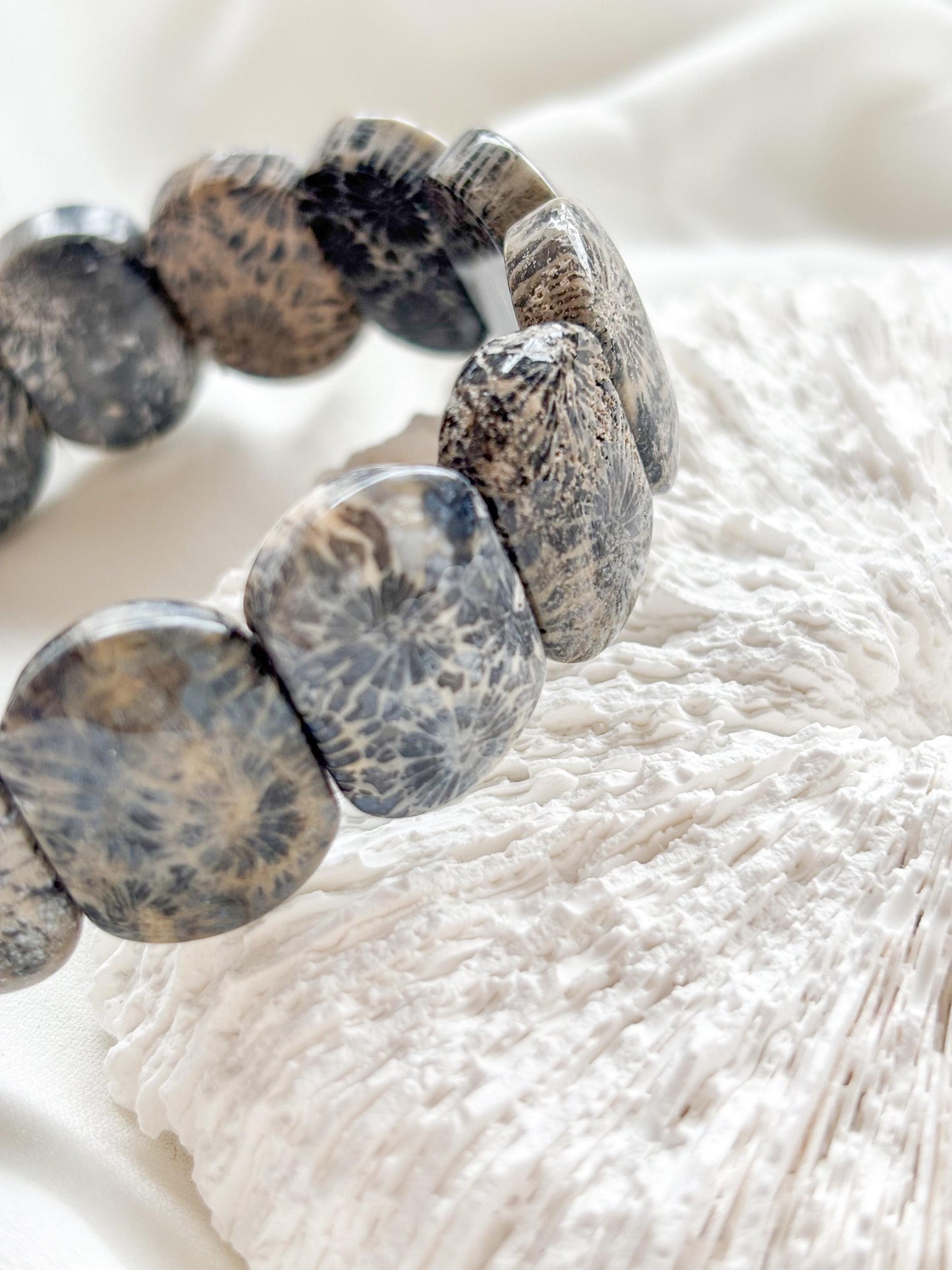 Earth’s Timeless Bloom – Charcoal Fossil Coral Daisy Bracelet