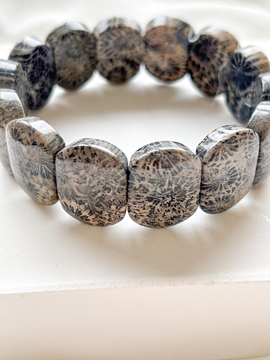Earth’s Timeless Bloom – Charcoal Fossil Coral Daisy Bracelet