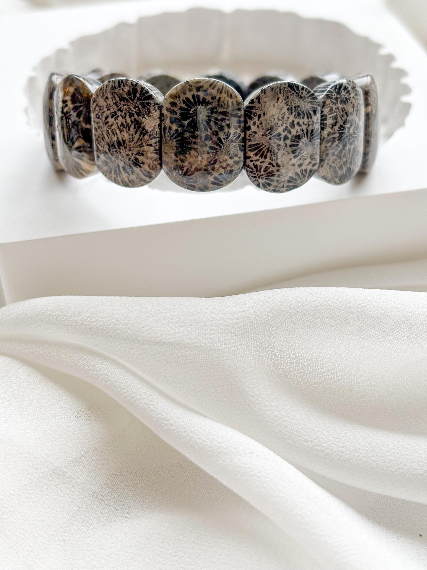 Earth’s Timeless Bloom – Charcoal Fossil Coral Daisy Bracelet