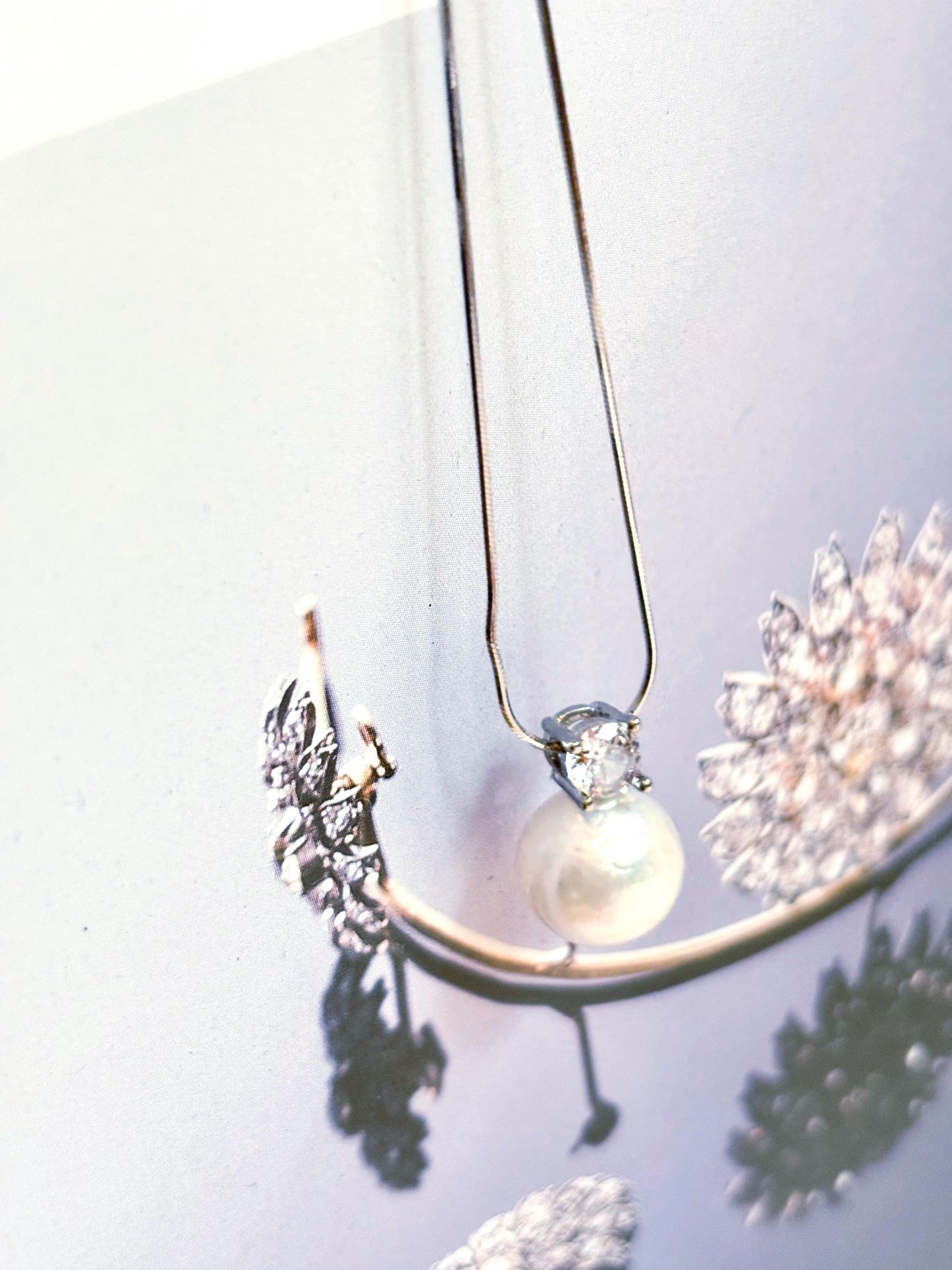 Royal Grace – White Pearl & Moissanite Solitaire Necklace