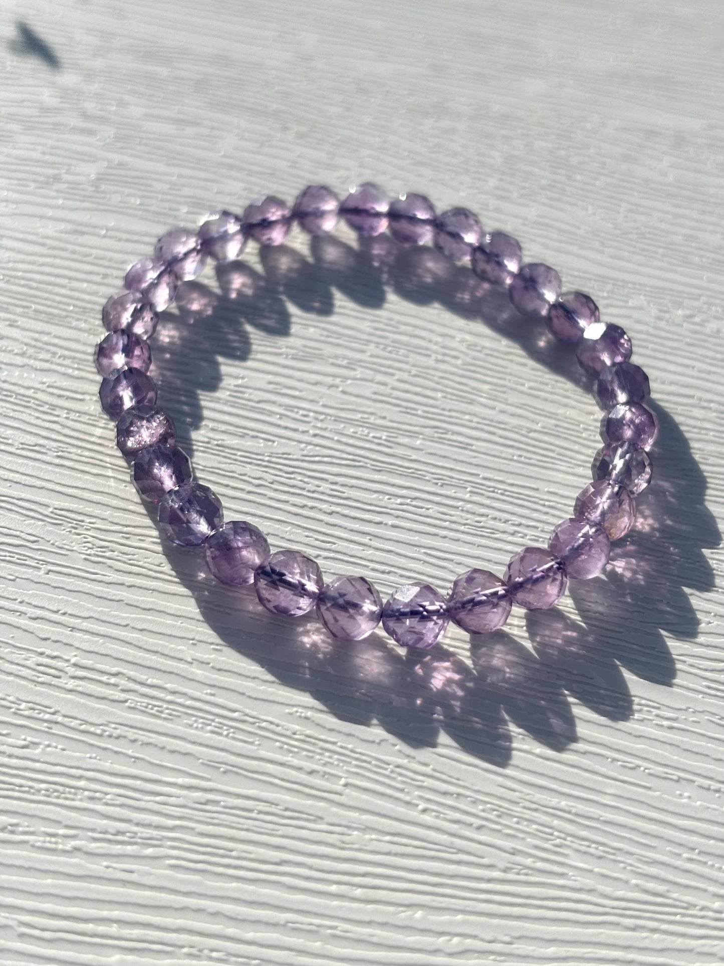 Purple Gleam – Faceted Amethyst Glow Bracelet