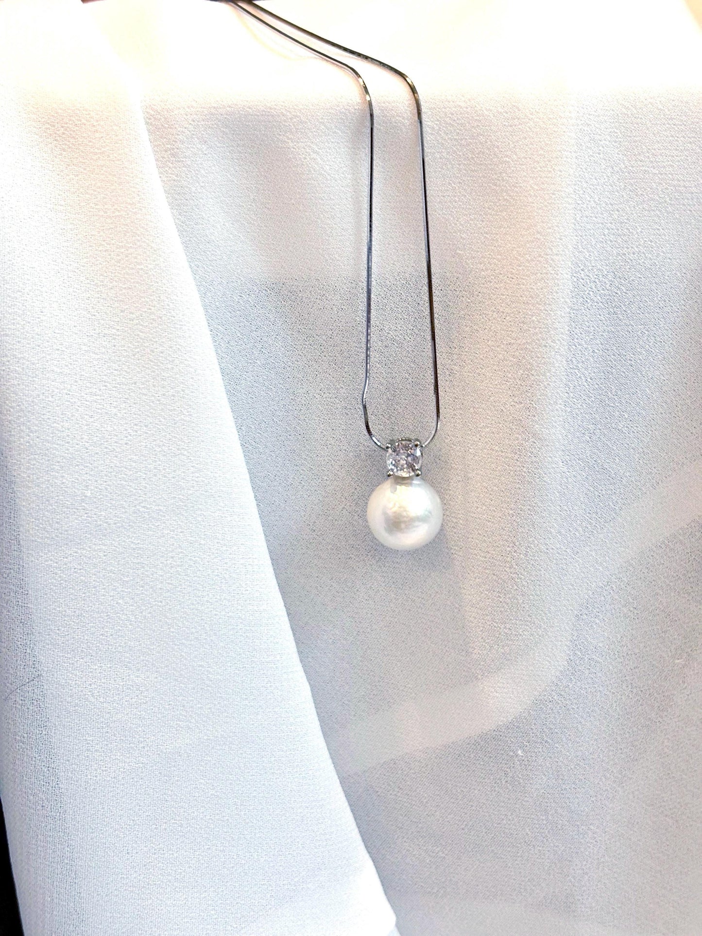 Royal Grace – White Pearl & Moissanite Solitaire Necklace