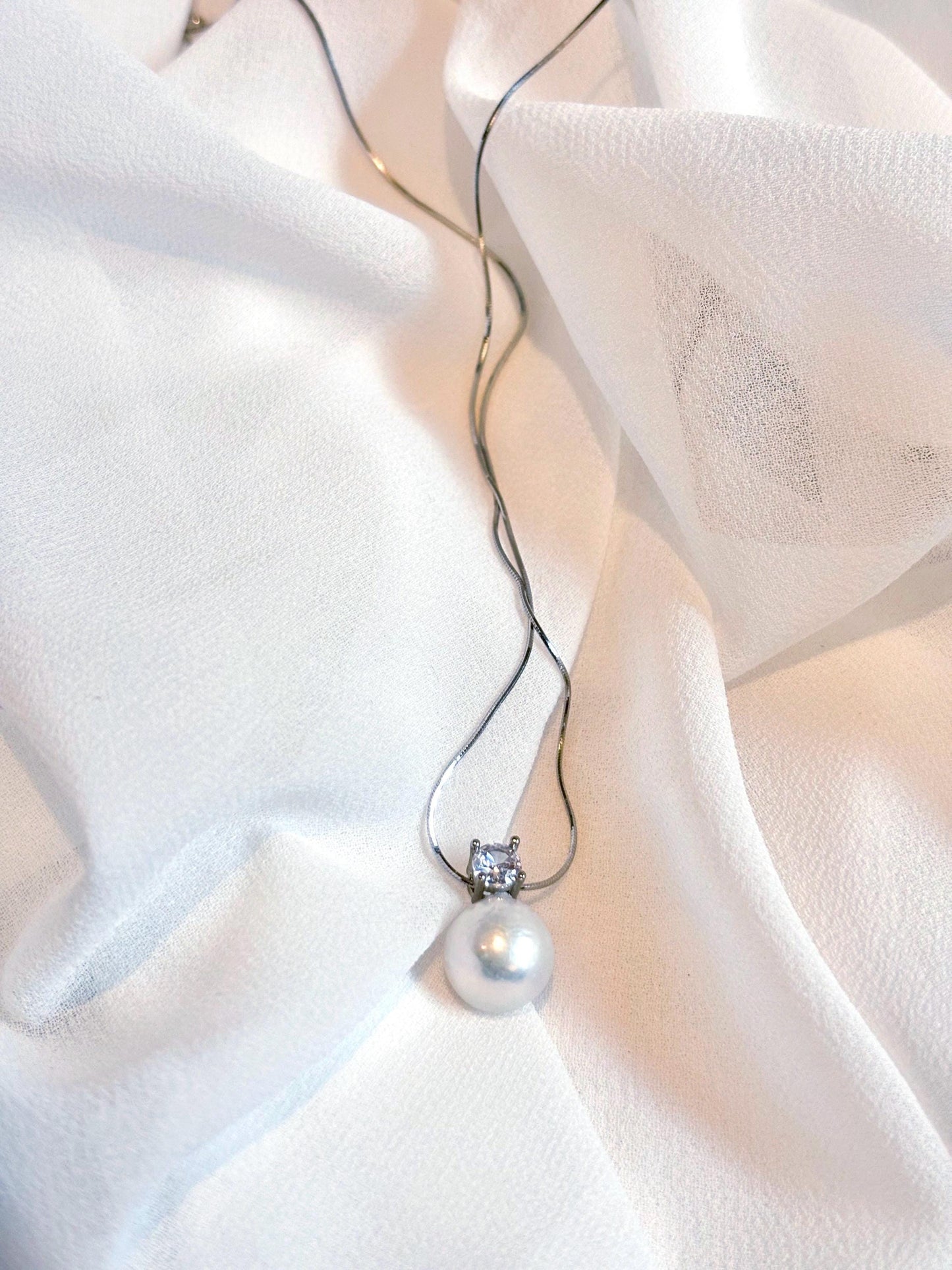 Royal Grace – White Pearl & Moissanite Solitaire Necklace