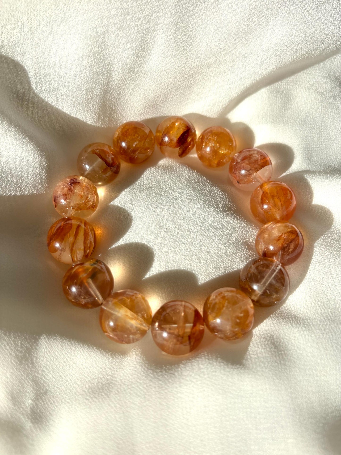 Amberveil – Hematoid Quartz Forest Glow Bracelet