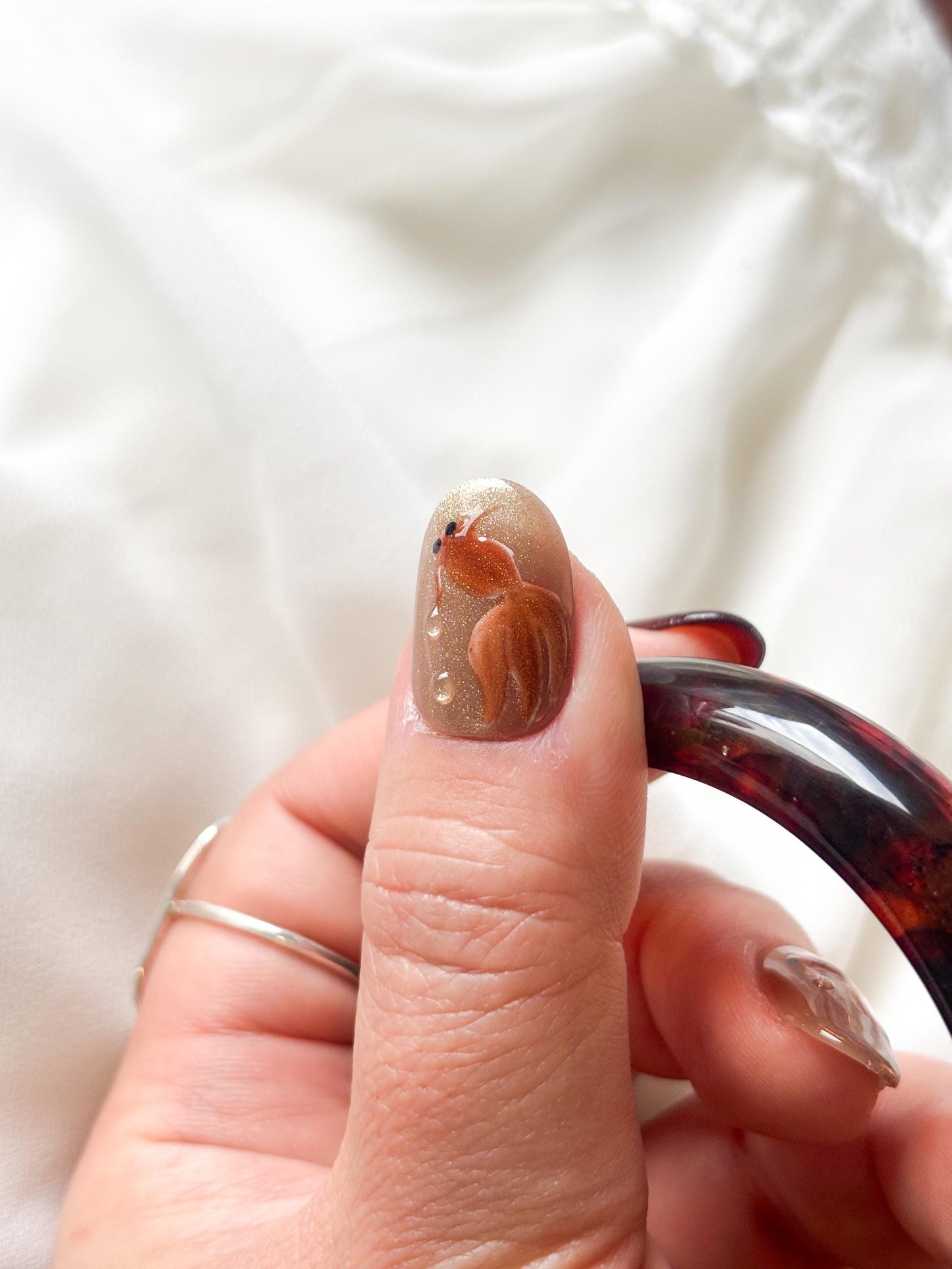 Golden Pond – Glitter Gold & Brown Press-On Nails with Gold Fish Accents | Reusable Nail Set