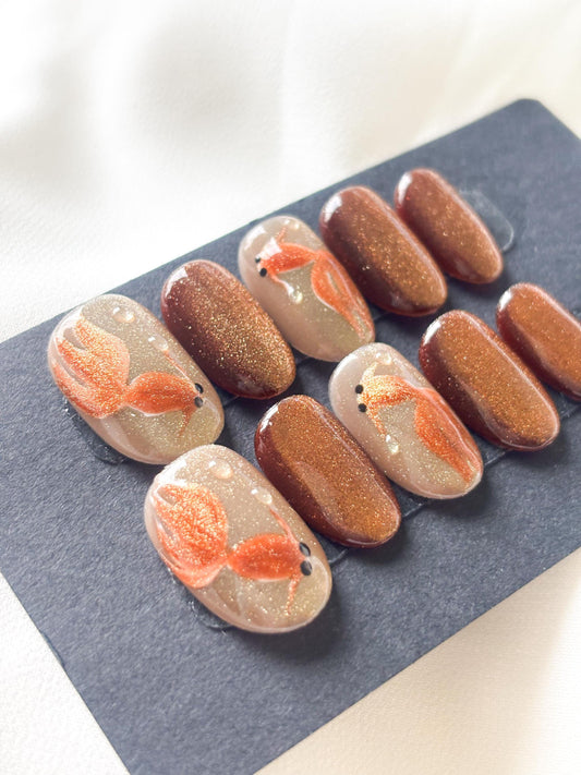 Golden Pond – Glitter Gold & Brown Press-On Nails with Gold Fish Accents | Reusable Nail Set